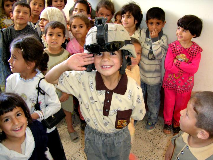 Iraqi school children photograph taken during a visit to a school, taken by an American soldier in Charlie Company, 1/252 Army Reserve Battalion.